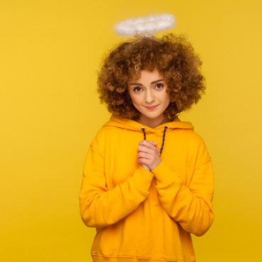 Portrait,Of,Kind,Lovely,Curly-haired,Hipster,Woman,With,Saint,Nimbus